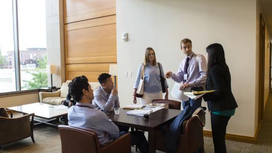 Group discussion around table at Harvard Law School